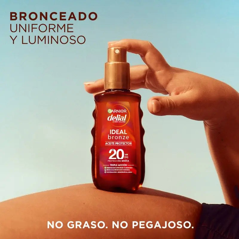 Garnier Delial Ochranný olej na opaľovanie SPF 20. Optimálne opálenie, saténový vzhľad, odolný voči vode, nelepivý, 150 ml
